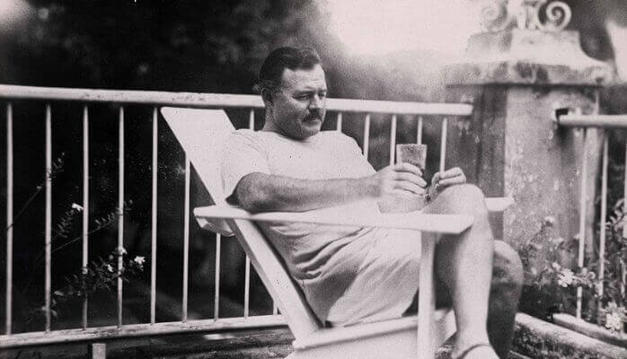 Ernest Hemingway sitting